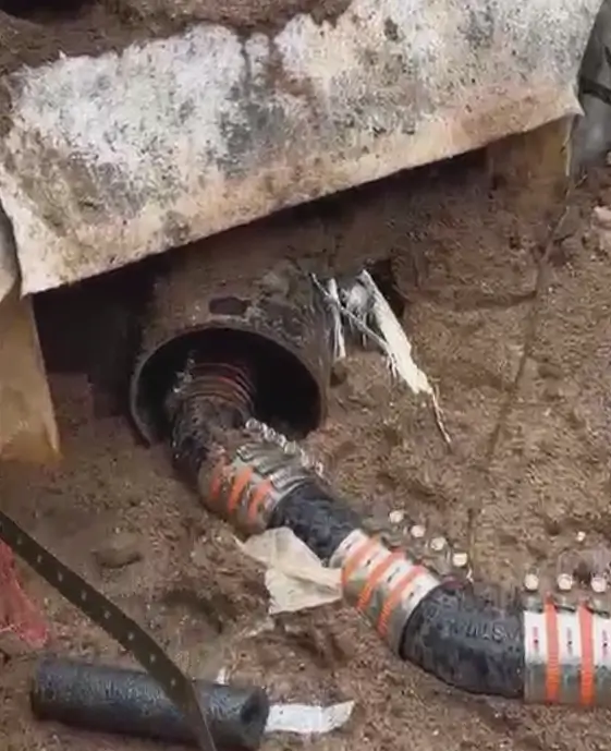 Sewer pipe connection entering the foundation