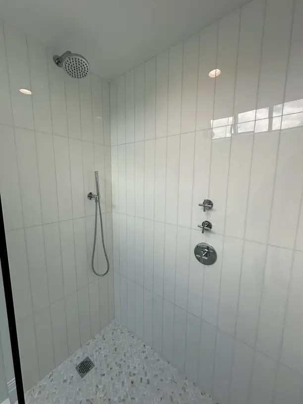 White tile walk-in shower