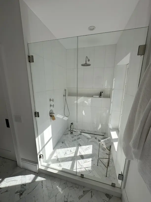 Glass shower enclosure