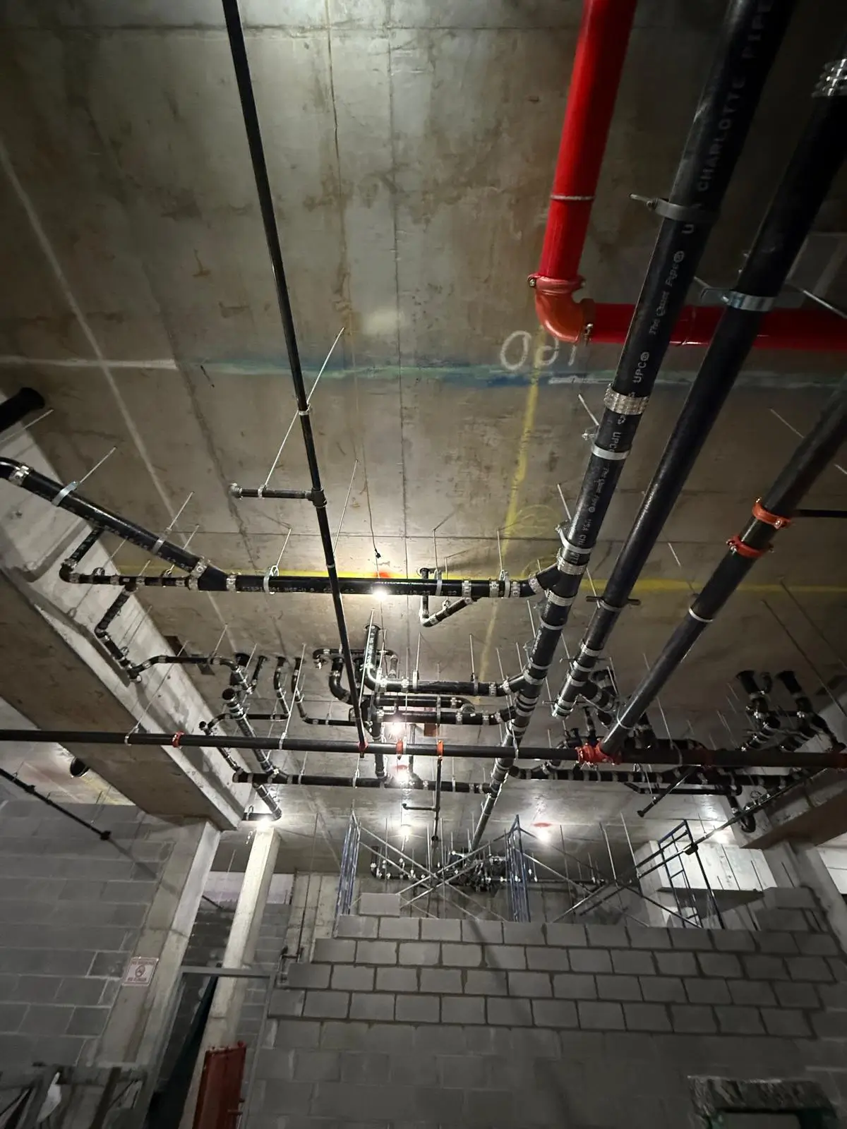 Overhead plumbing and fire sprinkler system installation