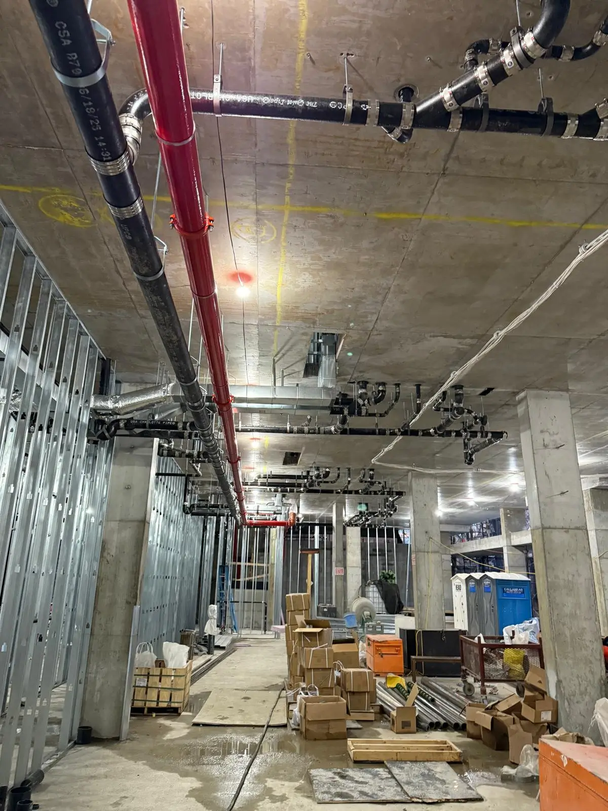 Commercial plumbing rough-in installation in progress