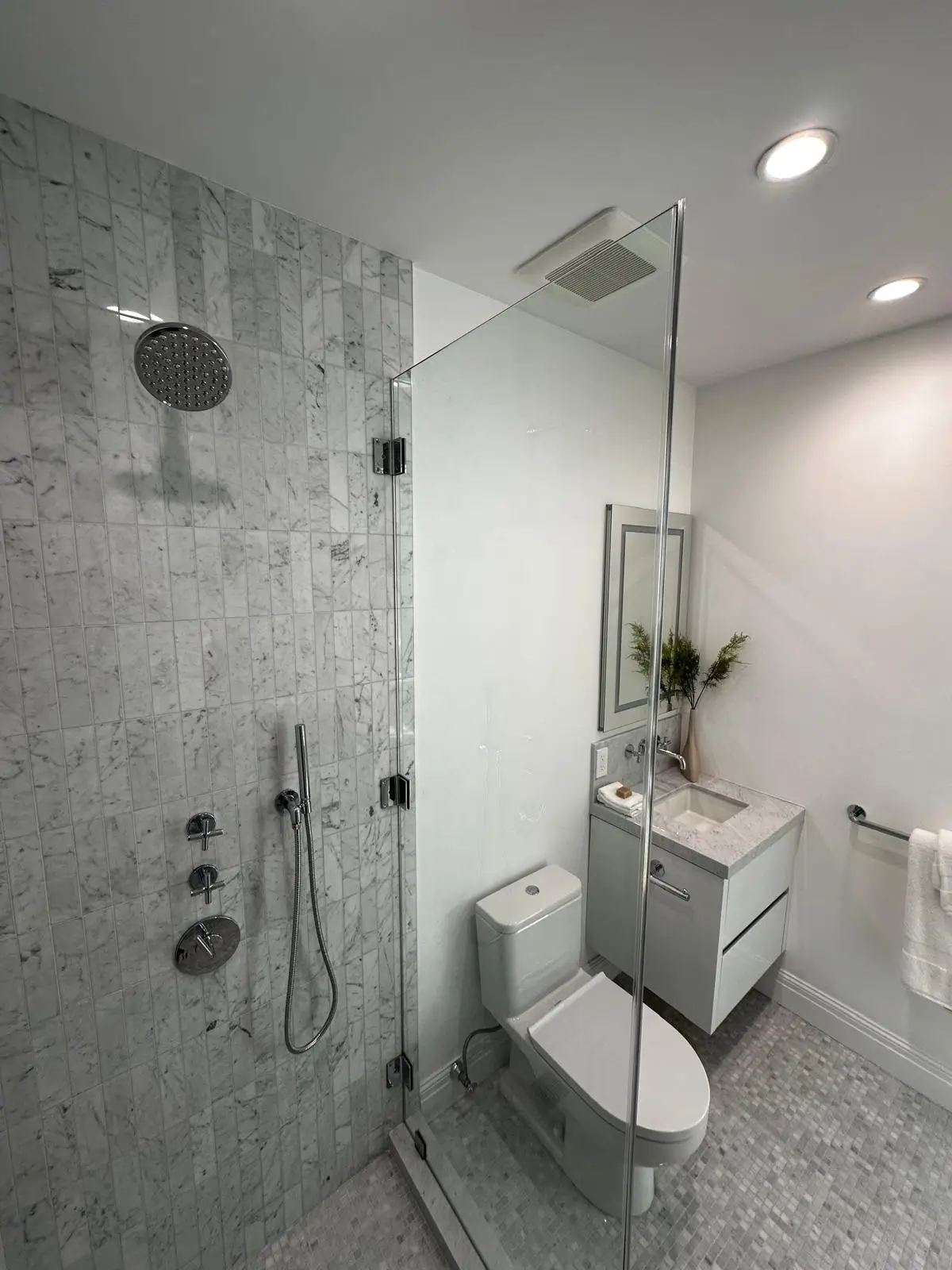 Gray tile shower renovation
