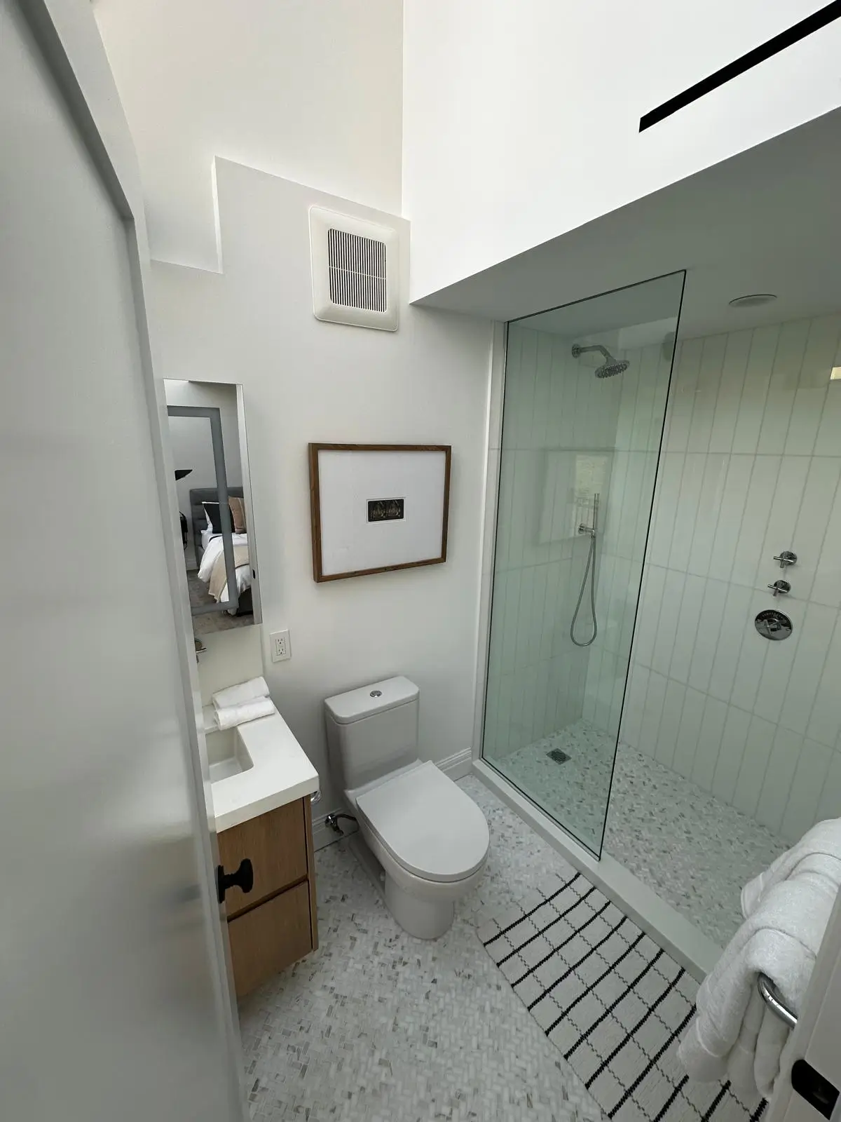 Bathroom with glass shower and vanity